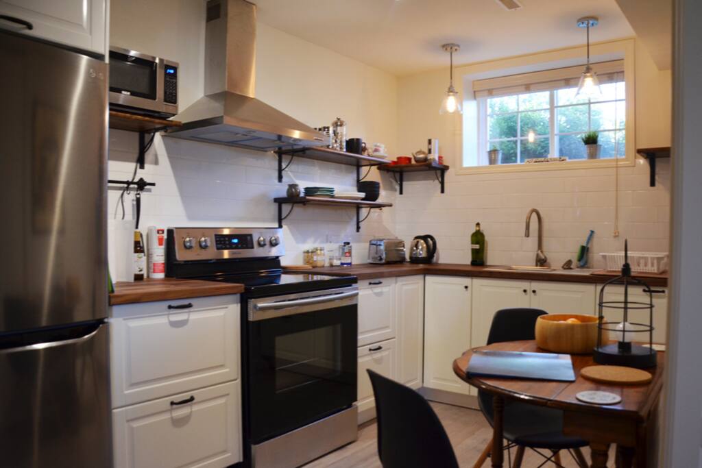 Deluxe kitchen with everything you need to cook (plus that black book if you want to eat out!)