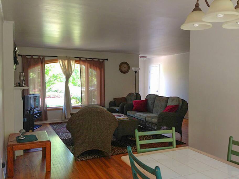 Extended view of dining and living room.