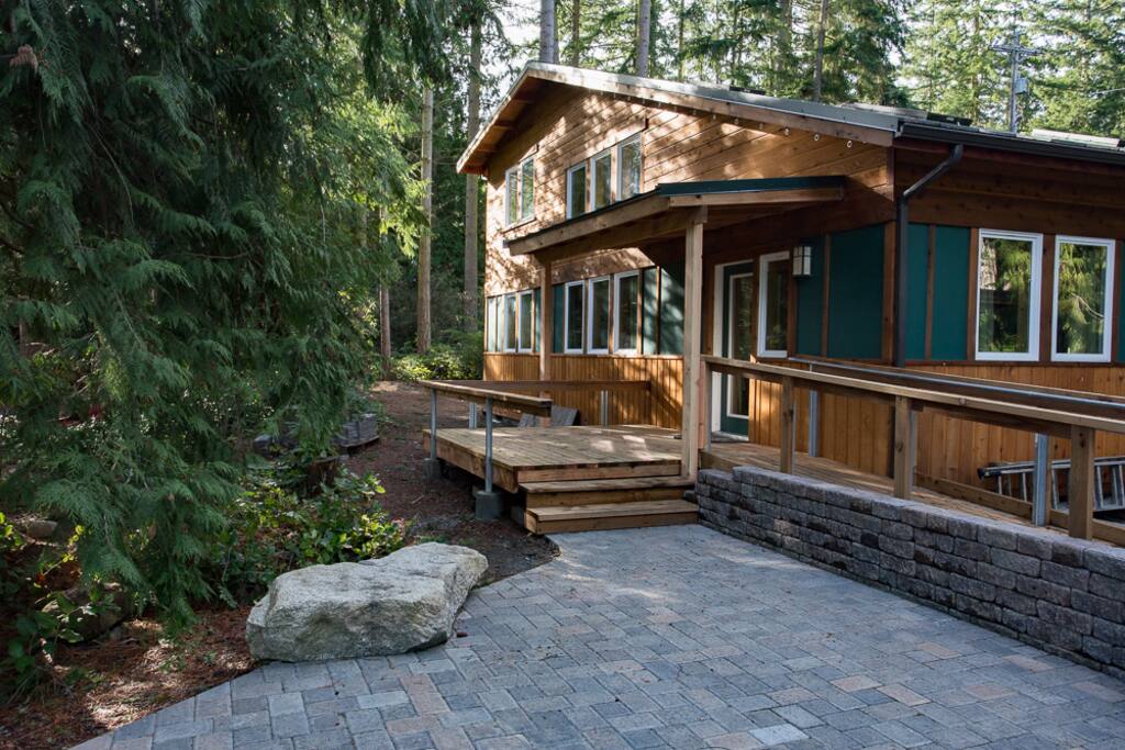 Deck and patio behind house