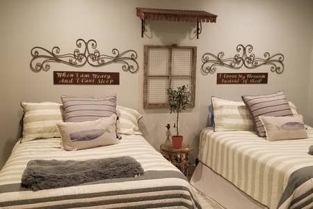 The Green  Room  - The name adapted from our travels with artists in the Music business.  Has a Queen bed and a double bed.  