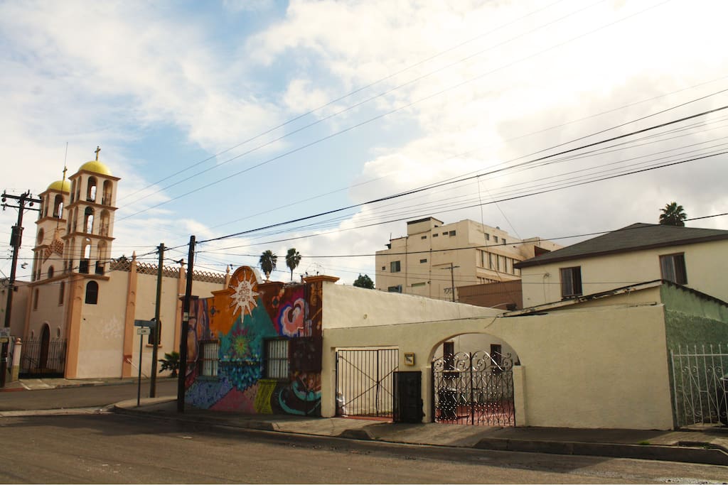 Right next to the church. Front view of the entrance.