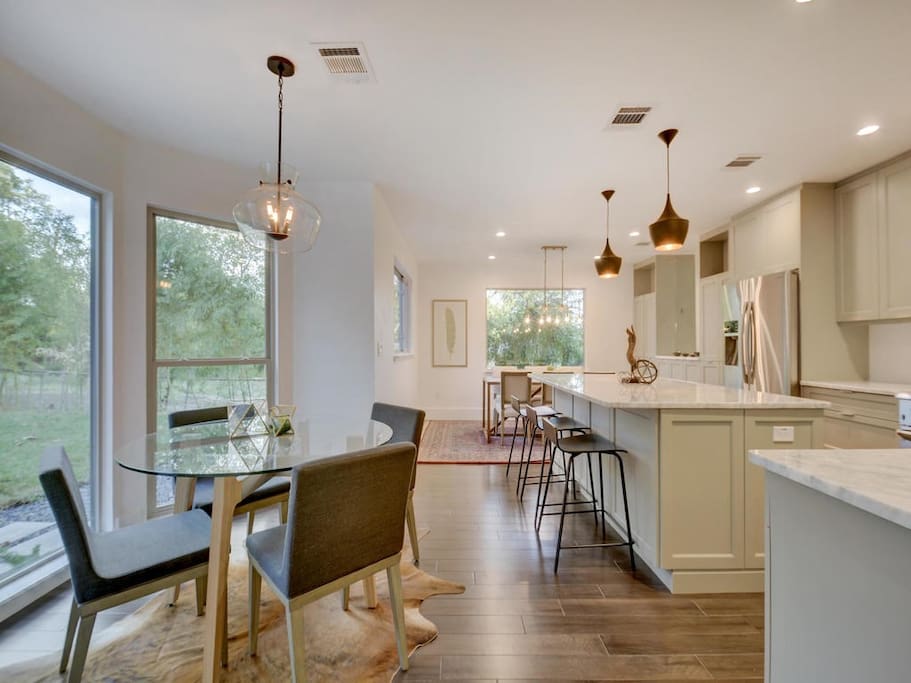 Formal dining table, breakfast area and kitchen counter seating