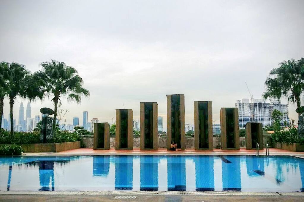 A large swimming pool and kids pool, Playground