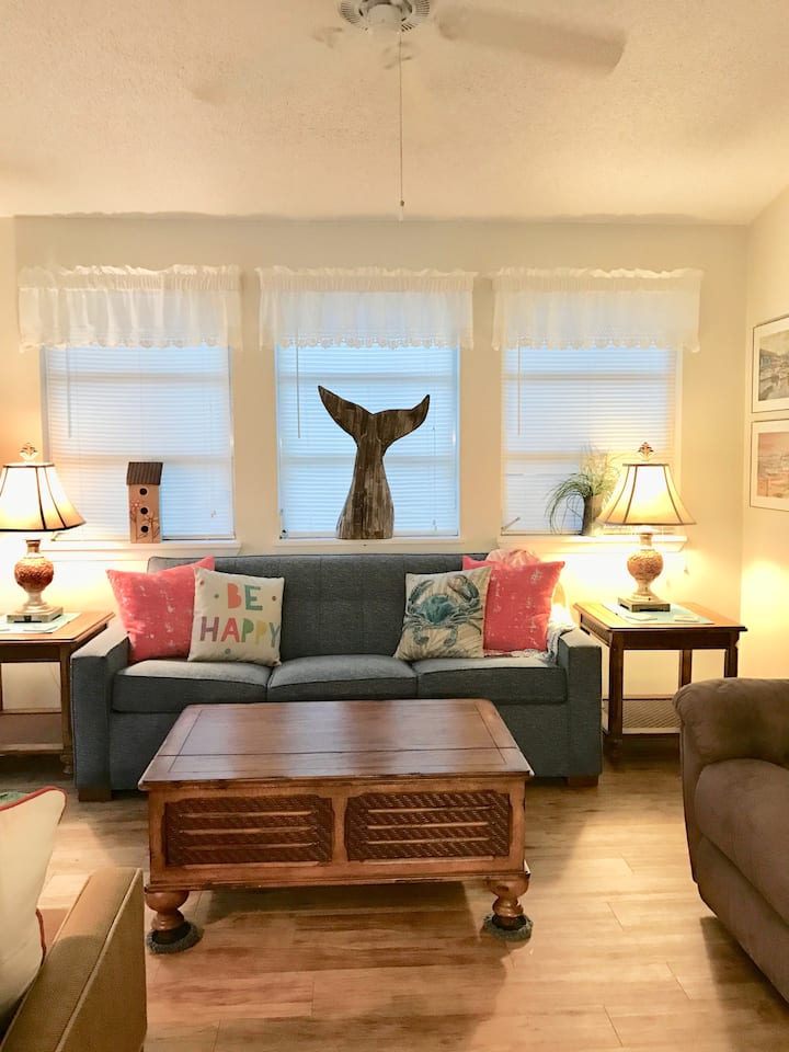 Sala de estar con sofá cama