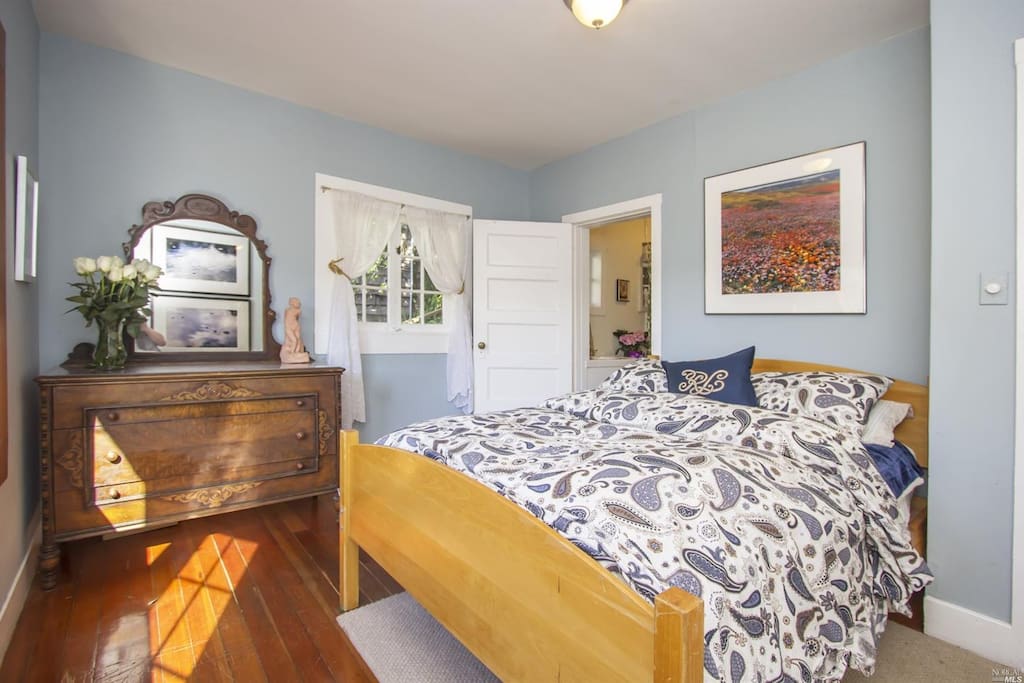 Master Bedroom with a Full bed and access to bathroom (shared)