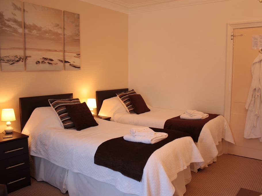 Two of the beds in room 1