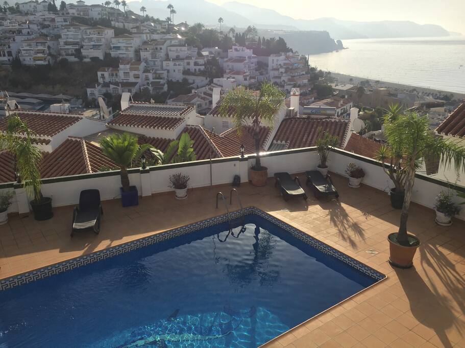 The beautiful view over the beach, the Mediterranean and Sierra Nevada mountains