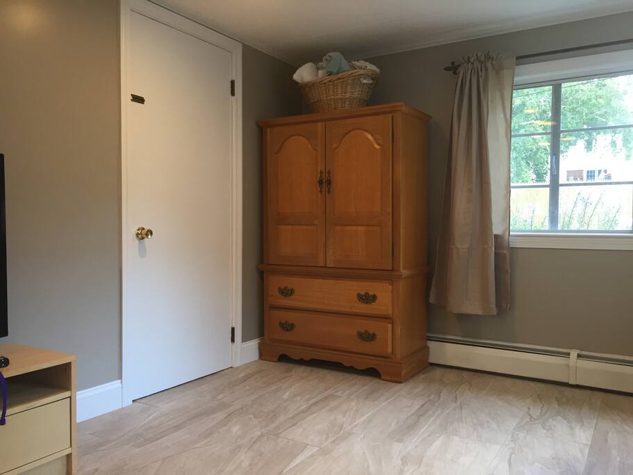Living/bedroom area guest cabinet