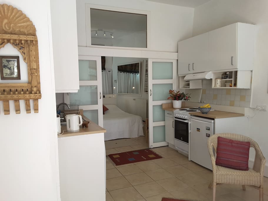 The kitchen of the Wing is fully equipped and has a cooker, fridge, washing machine and dishwasher
