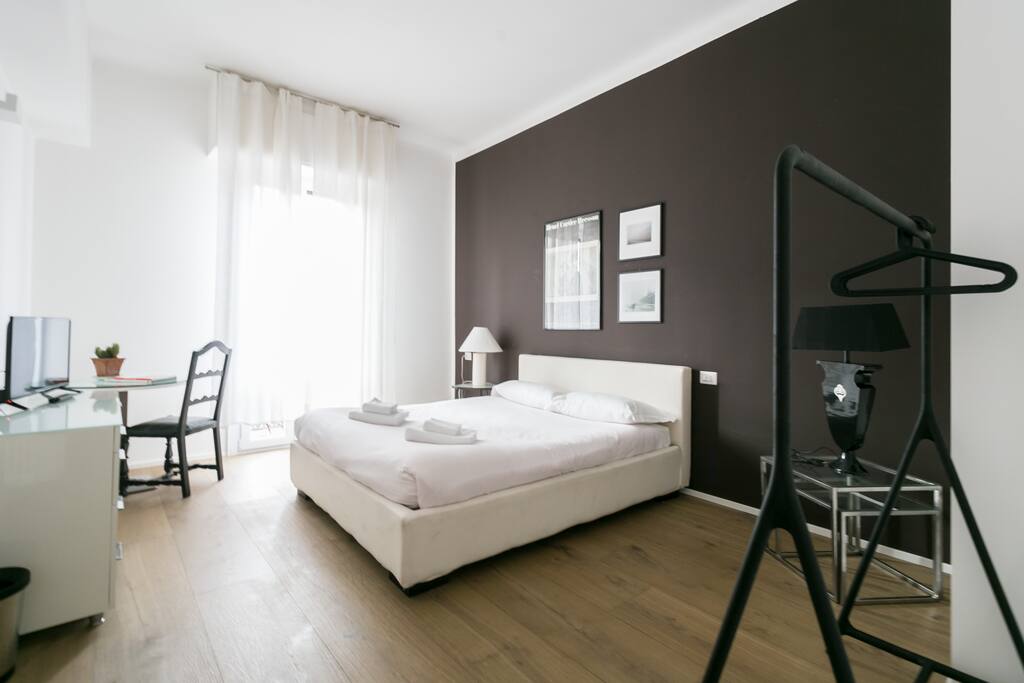 The Bedroom - The comfortable double bed with soft bed-linen and towels