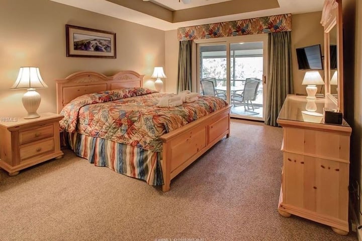 On the main floor Bedroom 1 has 2 closets, large bathroom, and sliding doors to screened porch. 