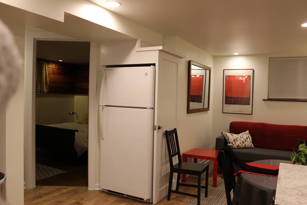 view from kitchen to living room and bedroom