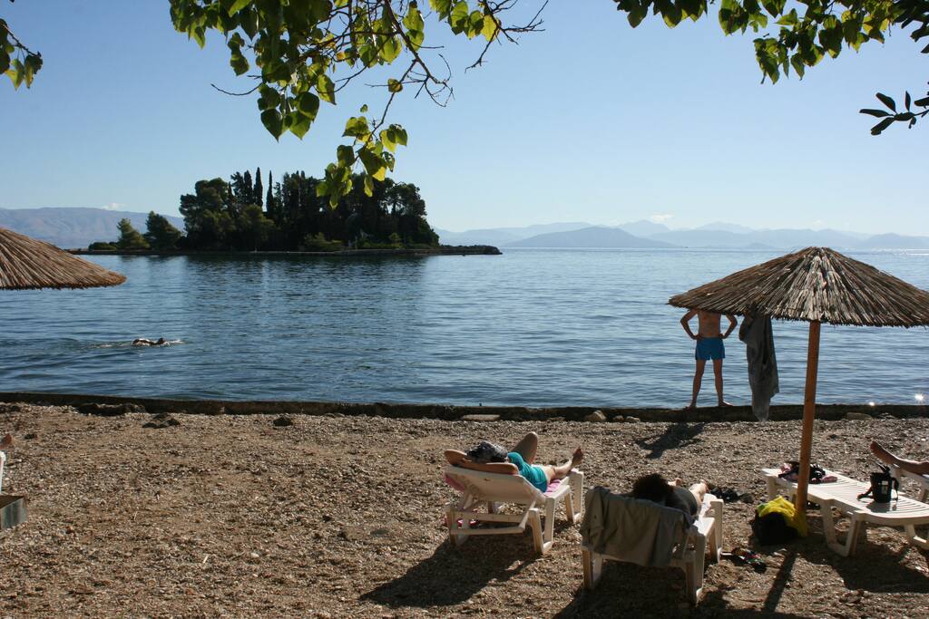The AEGLI HOTEL`s Beach is 300 metres down the hill,oposite Pontikonissi!!!