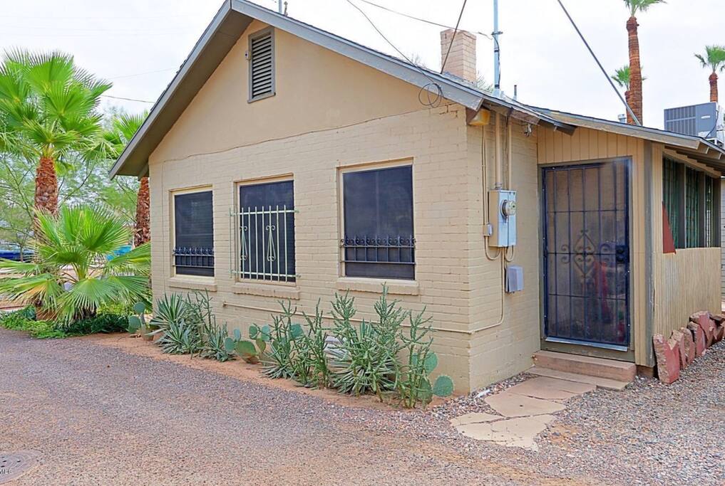 Private rear entrance next to parking space.