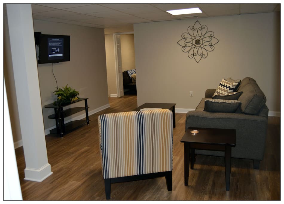 Comfortable living space with flat screen TV.
