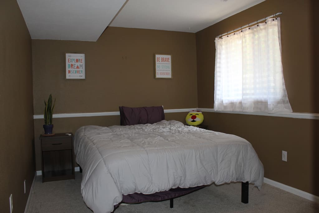 Private bedroom with a queen size bed