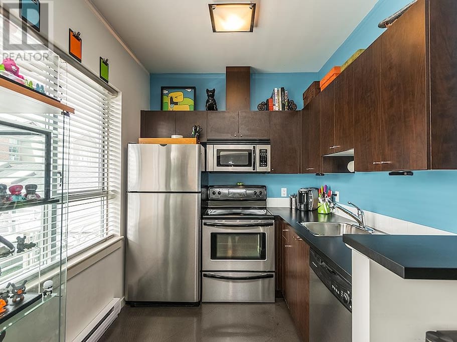 Stainless steel appliances, and plenty of storage/workspace.