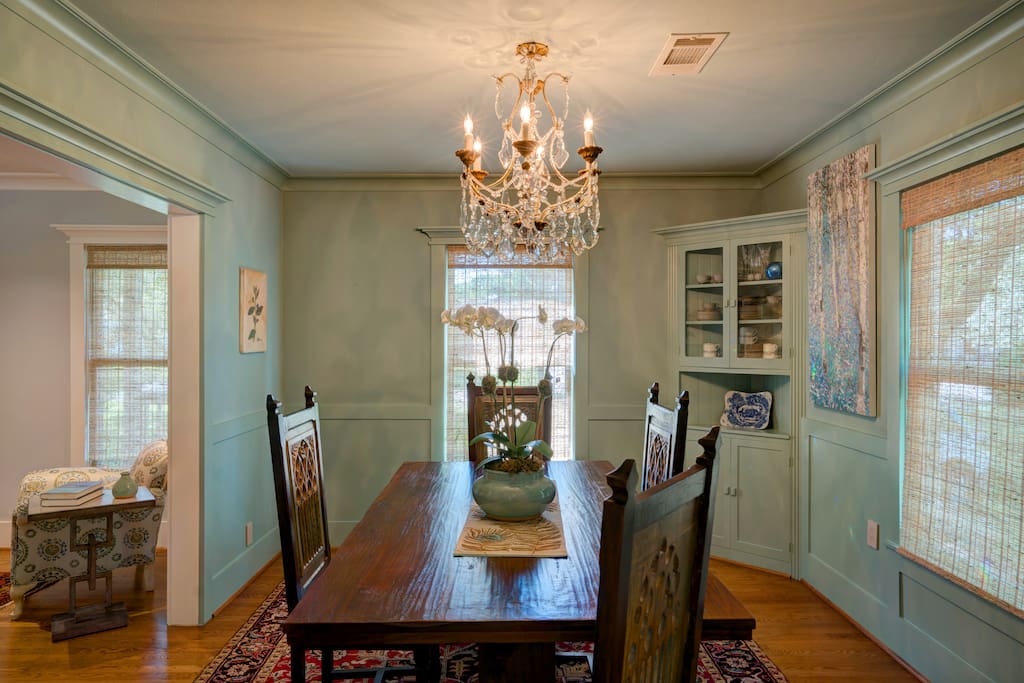 Dining Room with large trestle table and chandelier