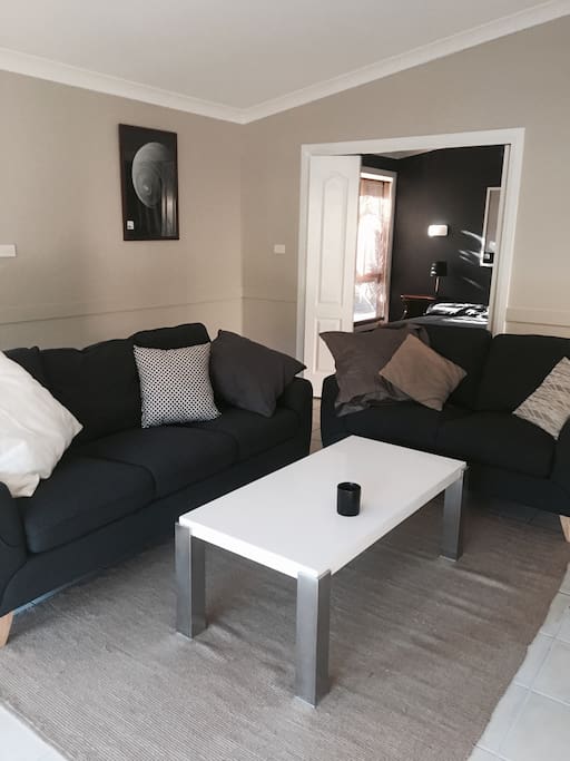 Large living area with wide screen TV