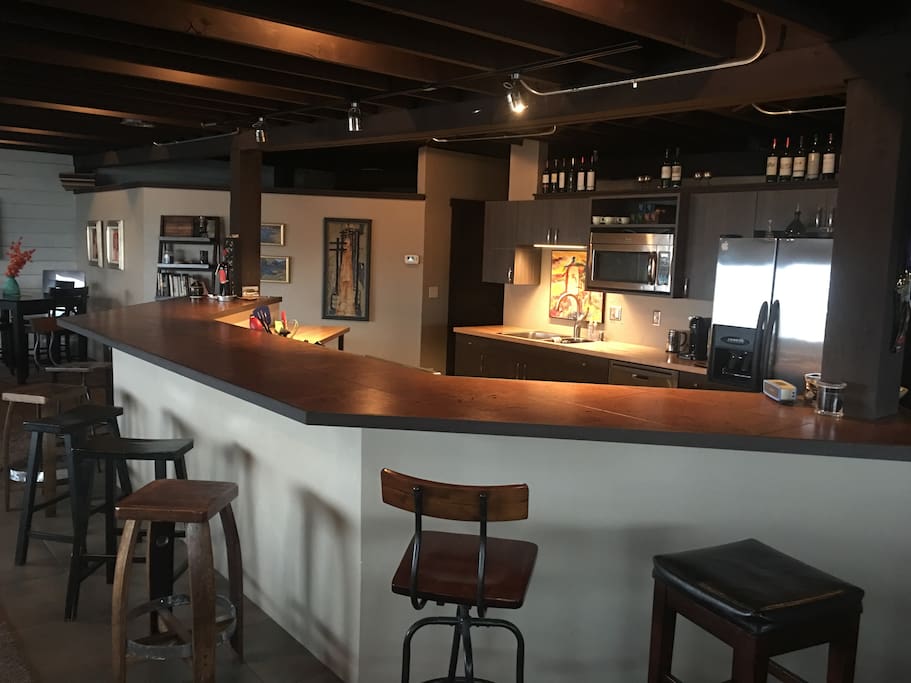 big bar seating area overlooking kitchen