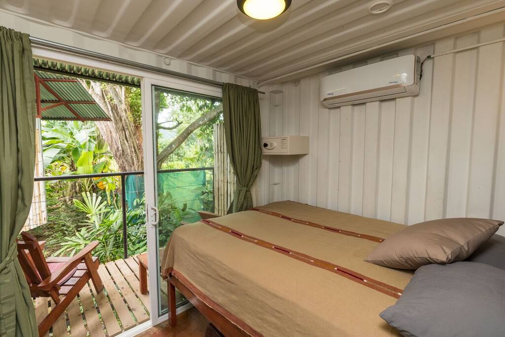 Queen size bed and private deck.