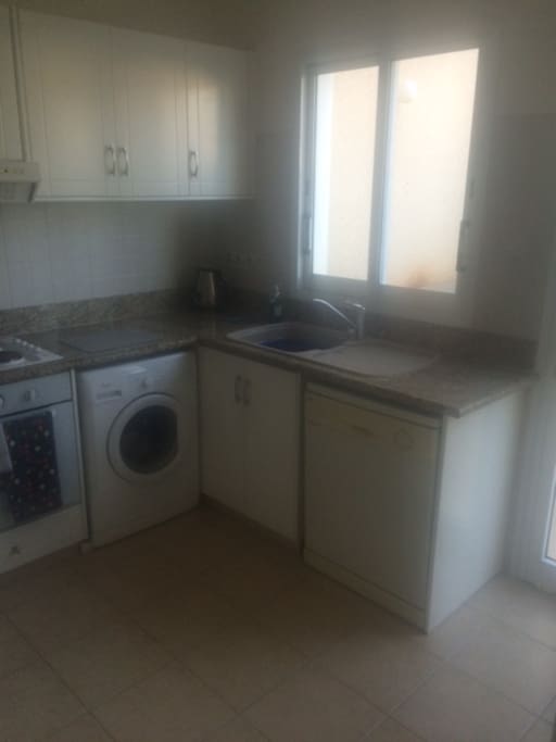 Well uequipped Kitchen with American fridge freezer, microwave.
