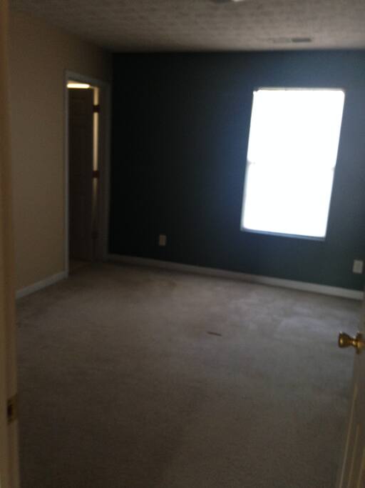 Back bedroom with private full bathroom