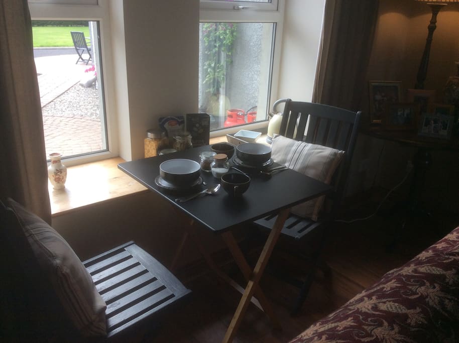 A table by the window , some cereal, yogurt and coffee/tea before leaving to explore!