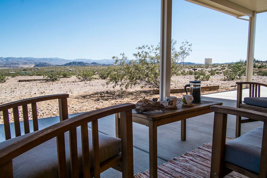 Large covered patio with panoramic views of the mountains