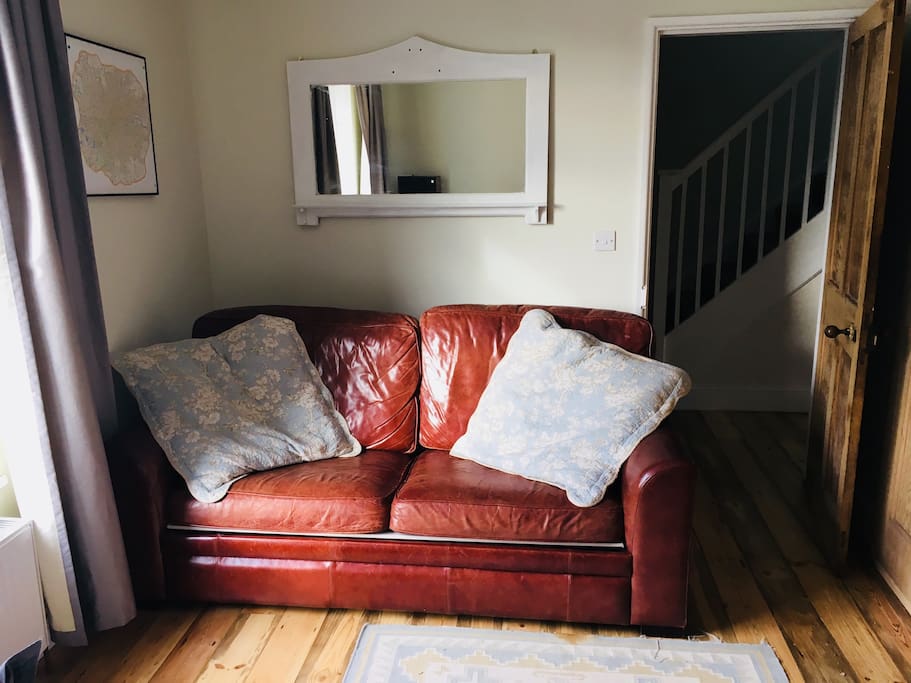 Front room with sofa bed.