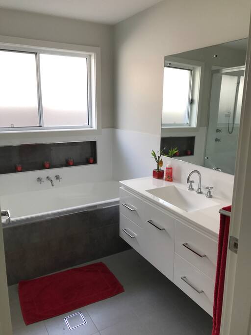 Vanity, Bath and Shower. Not pictured but available is a seperate toilet.