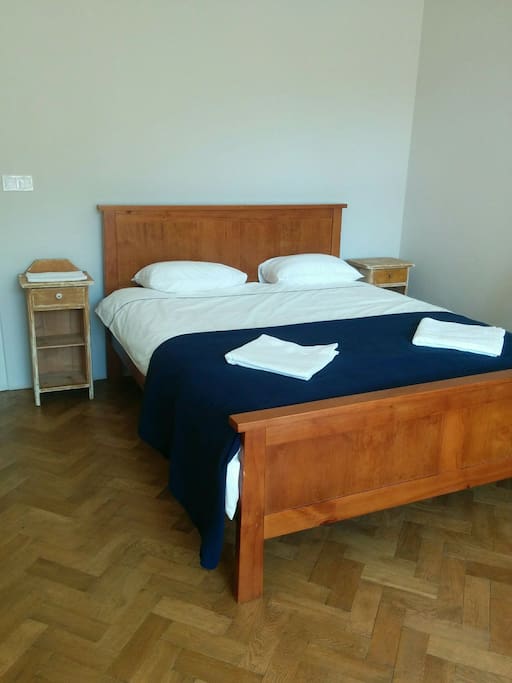 Both rooms have queen-sized beds and fresh linens.