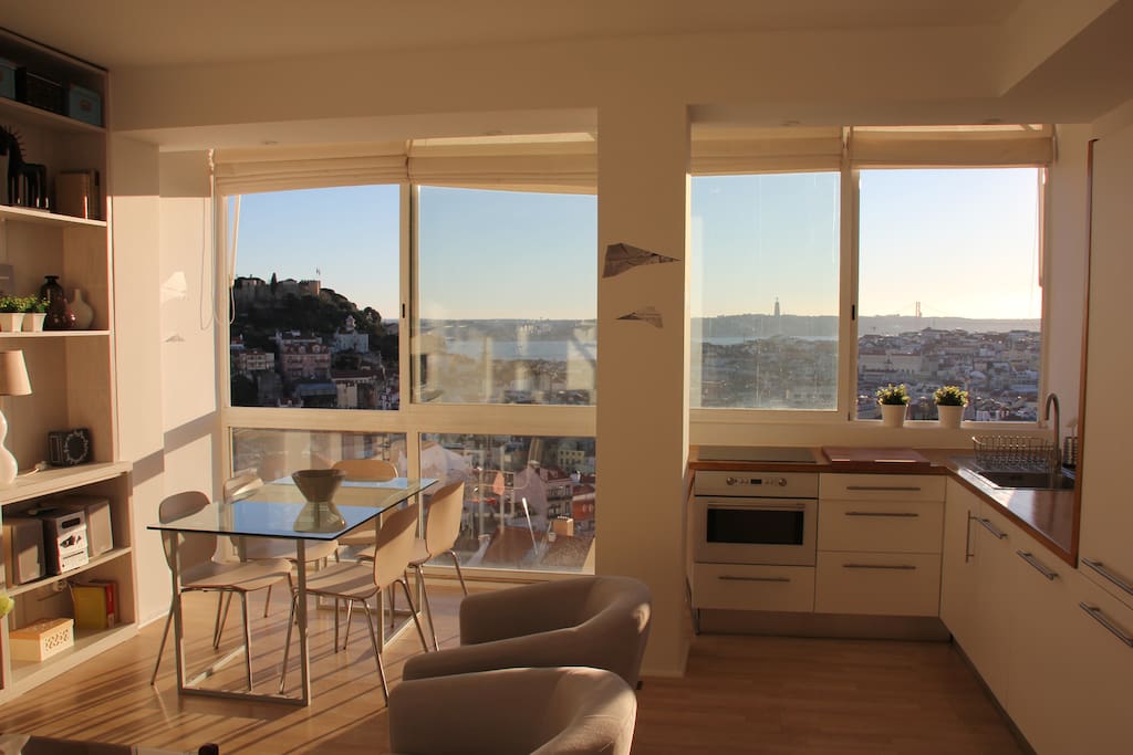 Bright spacious living room with a kitchenette