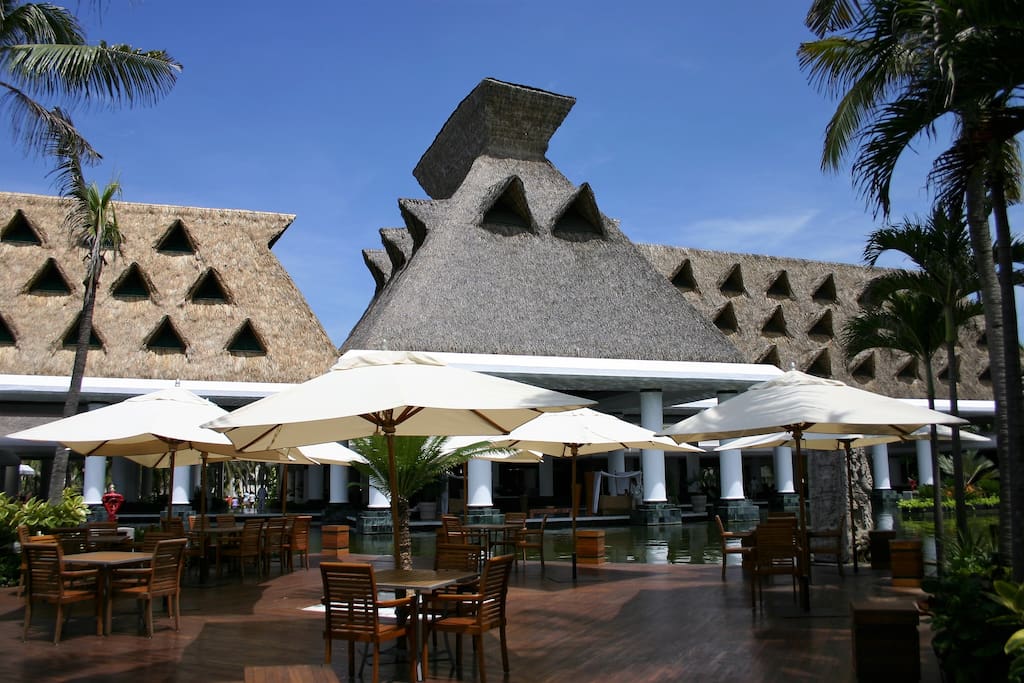 Savor tropical frozen drinks and lunch at one of the open-air restaurants or bars.