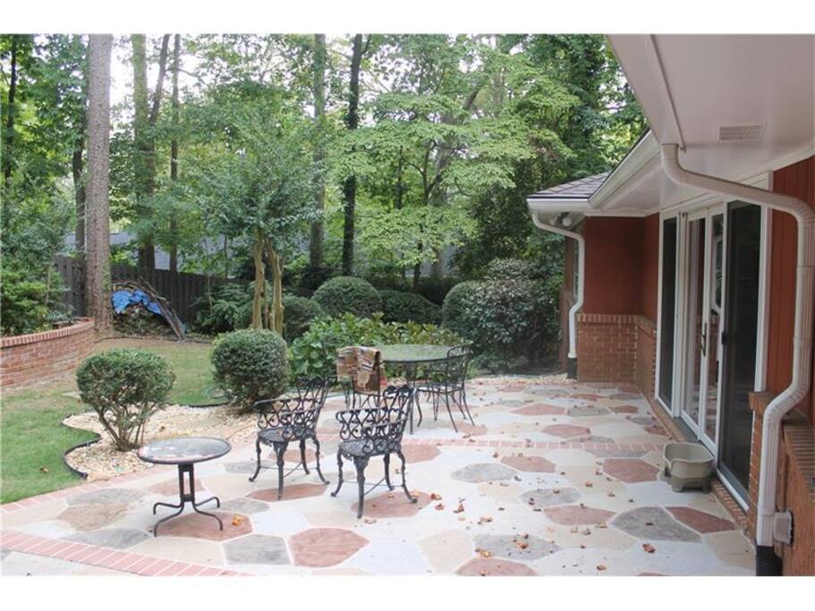 Beautiful wooded backyard with an abundance of birds! Feel free to fill the bird feeders for your enjoyment!