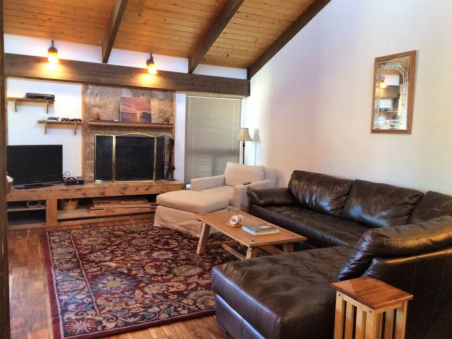 Living area with real fireplace and 20' ceilings.