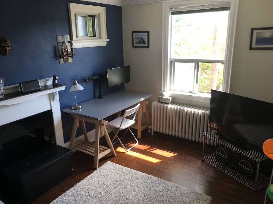 You have access to the TV, an Apple TV, and access to many streaming services (Netflix, etc). And a nice work station with access to a second screen with HDMI cable.