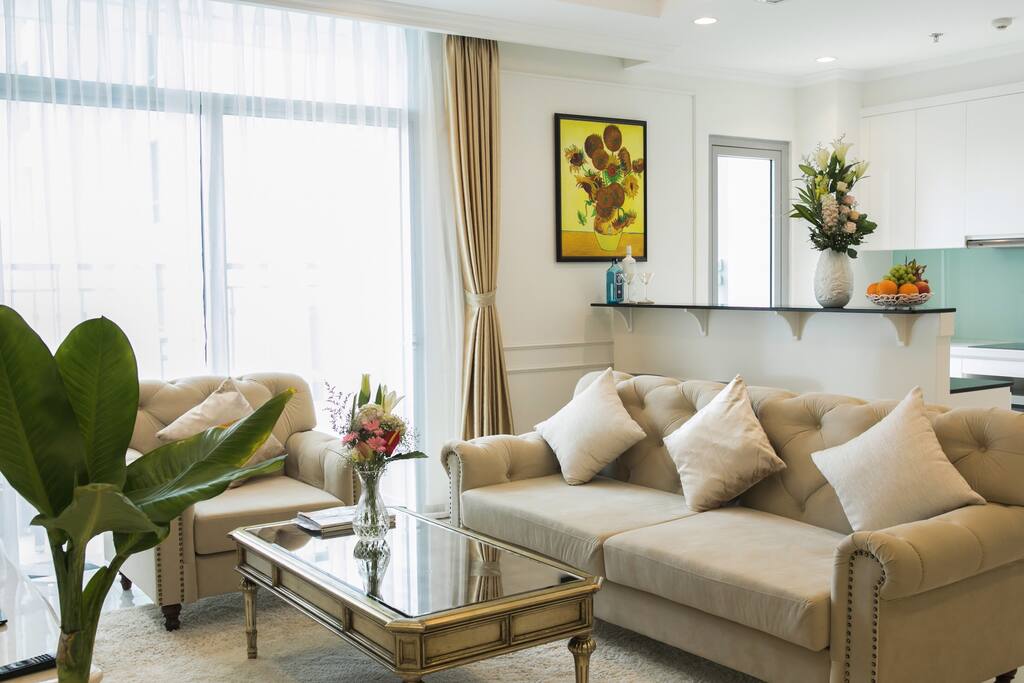 Living Room: 55" Smart TV (Netflix), French Louis coffee table, chesterfield styled sofas - all resting on a soft cream carpet :)
