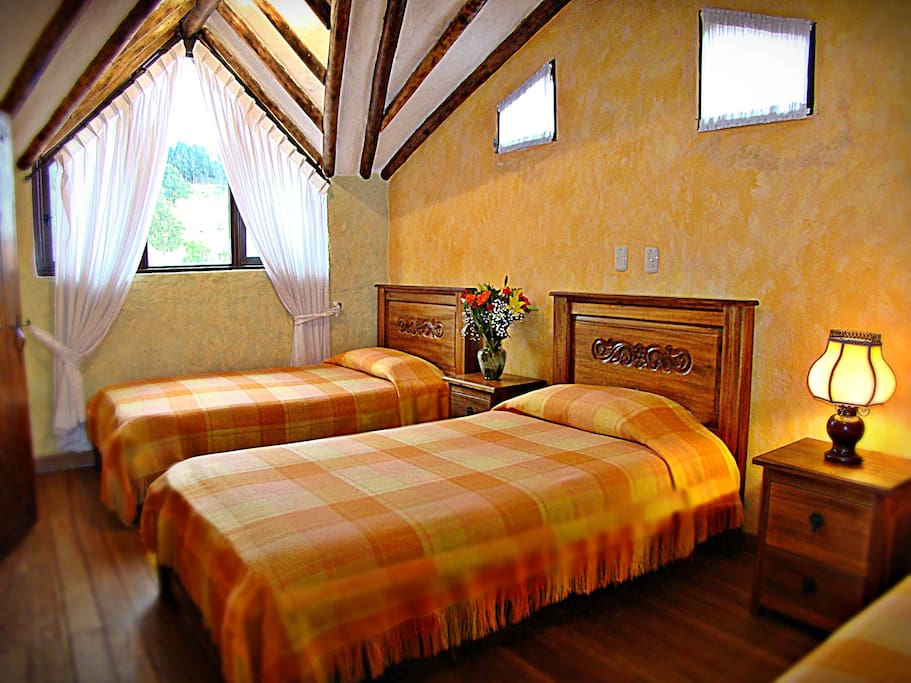 Habitación para tres personas con vista a Pueblito Boycense