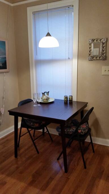 Cozy dining area can be a second work/read for laptop users.