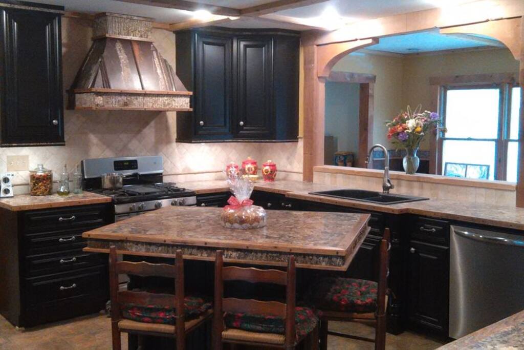 Custom made kitchen cabinetry with Rustic trim.