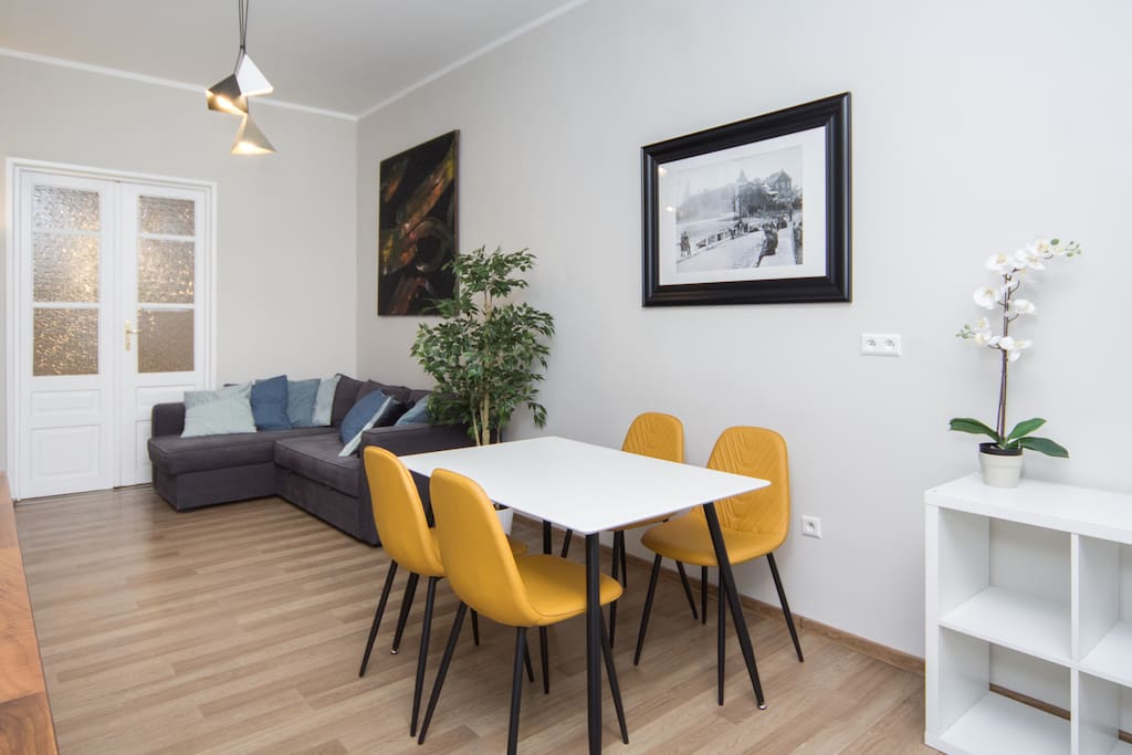 comfortable, living room (double sofa bed) with open-plan kitchen, dining area
