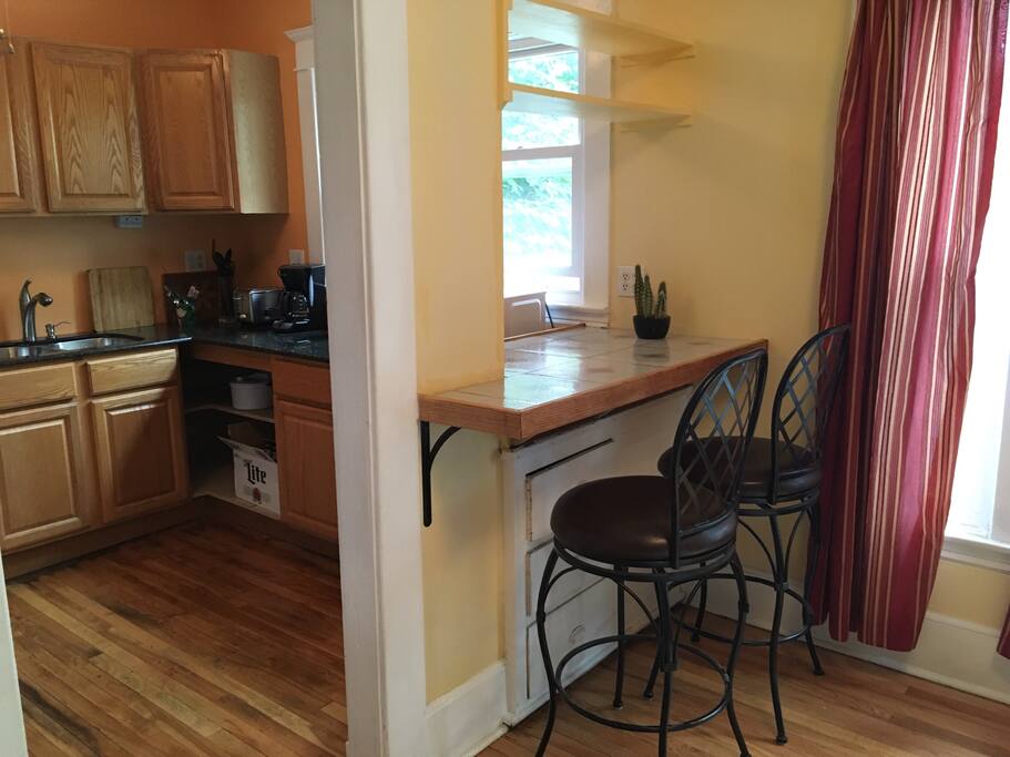 Convenient dining counter let's you visit while cooking
