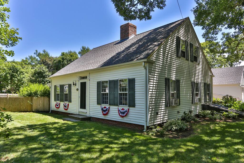 A view of the house with the front decked out of July 4th.