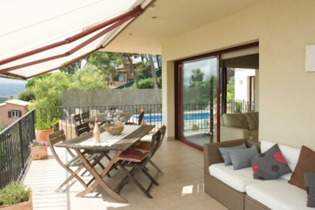 South facing terrace with electric blinds.