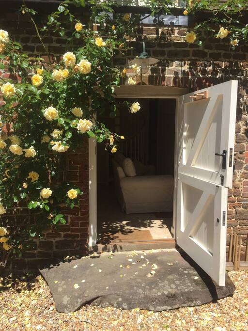 Split stable front door leading into the cottage from the yard