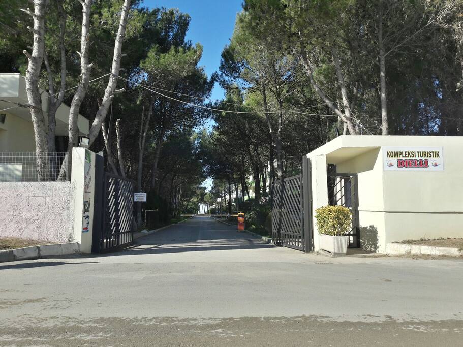 The main entrance to the residential area secured with guards and cameras.