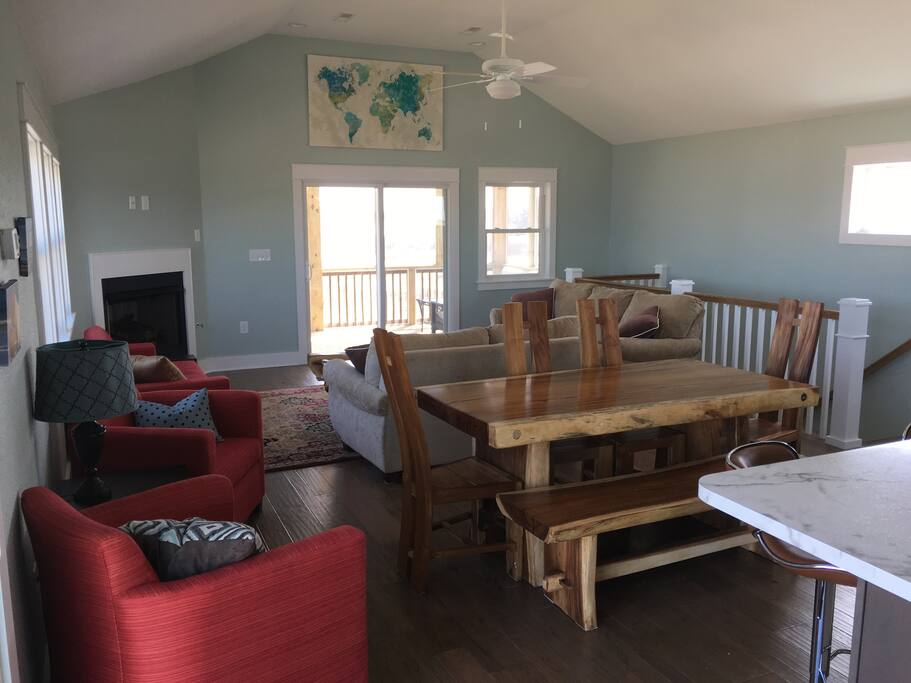 Dining and living area from the kitchen. This picture before tv was installed. (fireplace not for guest use)