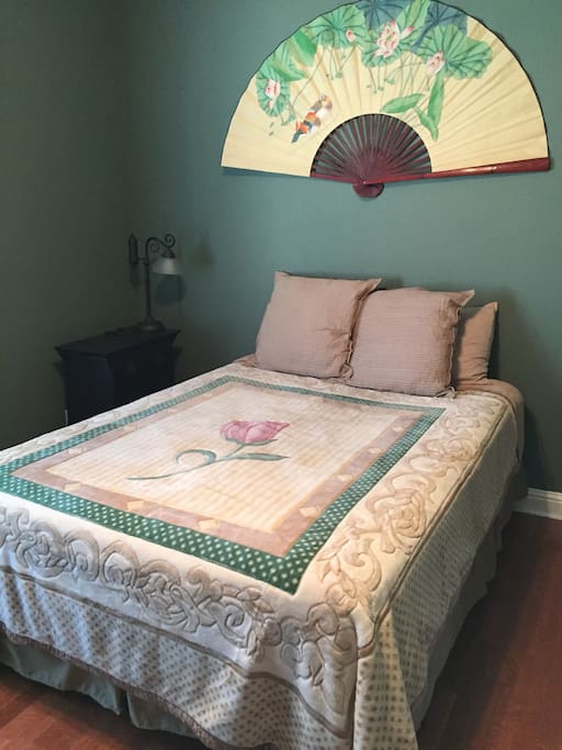 Spacious bedroom and comfortable queen sized bed.