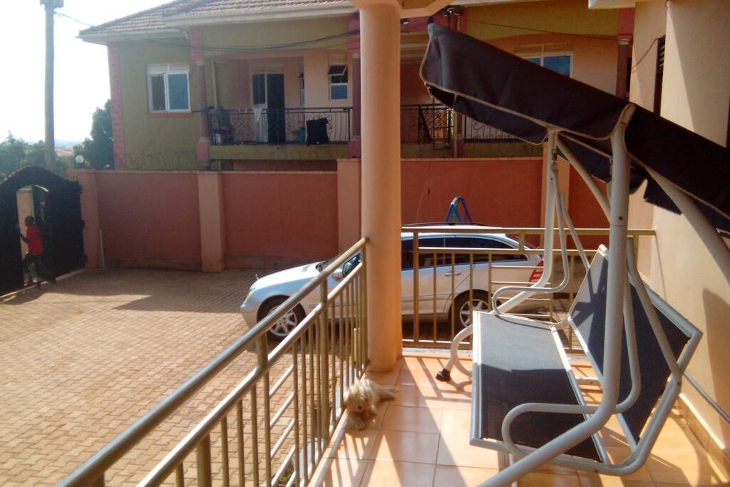Spacious parking and porch swing